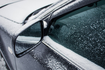 frozen car glass, car glass in ice with snow, frost, snowfall