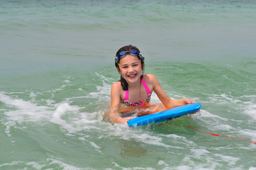 Big Smile While Riding a Boogie Board