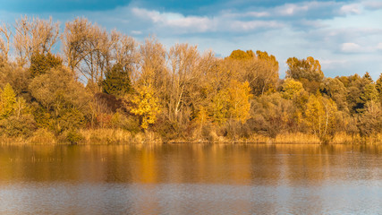 Beautiful autumn view with reflections at a pond near Aholming-Bavaria-German