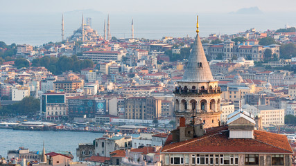 Fototapeta na wymiar Istanbul cityscape with Galata Tower and mass housing in Golden Horn, istanbul, Turkey