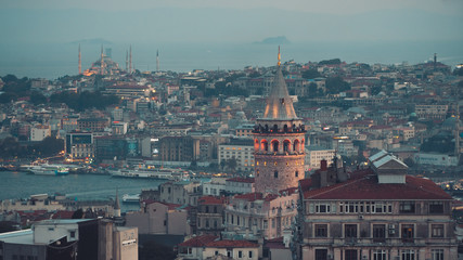 Naklejka na ściany i meble Istanbul cityscape with Galata Tower and mass housing in Golden Horn, istanbul, Turkey