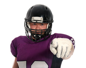 American football player wearing uniform on white background © New Africa