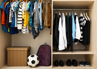 Large wardrobe with teenager clothes, shoes and accessories