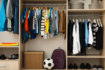 Large wardrobe with teenager clothes, shoes and accessories