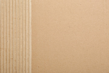 Naklejka na ściany i meble Piece of cardboard as background, top view