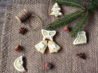 Christmas gingerbread cookies on burlap background