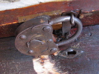 A shot of an old rusted metal lock