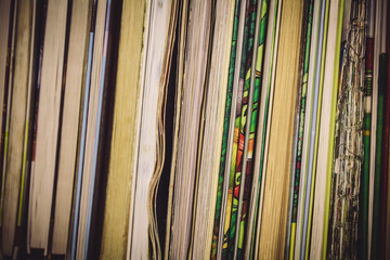 Books without a cover on the shelf