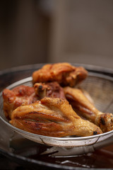 Fried chicken in hot oil and boiling in pan