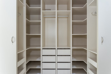 Modern closet in the hotel for different needs and clothes.