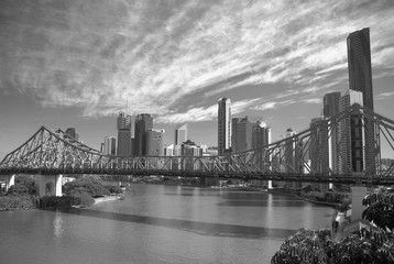 Story Bridge and skyscraper of Brisbane under blue skys with clouds