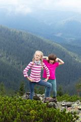 Fototapeta na wymiar girls child in the mountains