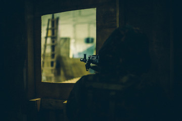Airsoft players conduct training indoors