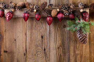 Christmas greeting card. Festive decoration on wooden background. New Year concept. Copy space.  Flat lay. Top view.