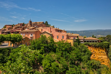 Fototapeta na wymiar The small village of Roussillon. Houses with ocher facades, Roussillon, Provence, Luberon, Vaucluse, France