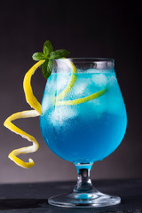 Glass of blue lagoon cocktail