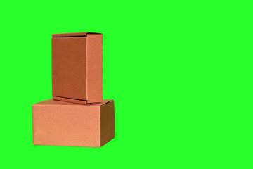Obraz premium Two boxes separately on a green background isolated no gift parcel people