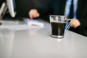 cup of black coffee in the office