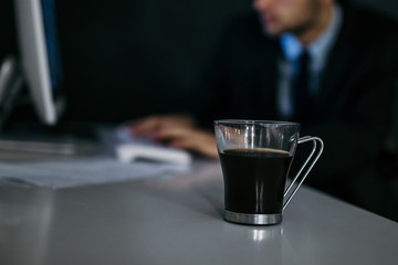cup of black coffee in the office