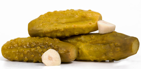 pickled cucumbers with garlic on a white background