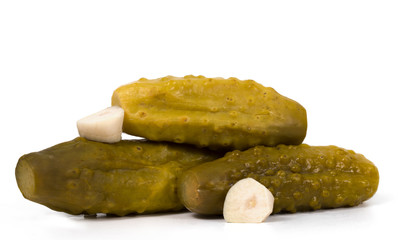 pickled cucumbers with garlic on a white background
