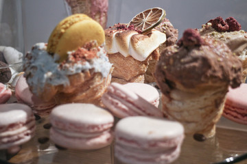 wallpaper from french macaroons, cakes and sweet in cafe, delicious beautiful dessert, soft focus in front