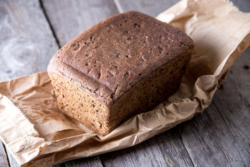 Healthy bread on old wooden background