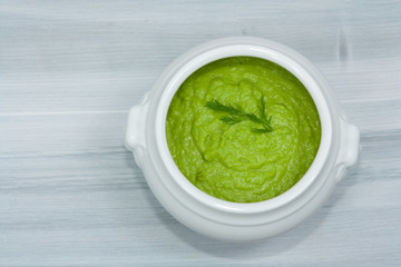 Green peas cream soup with dill.