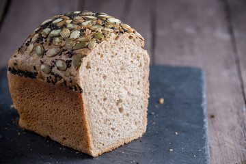 Healthy bread on old wooden background