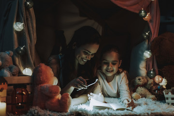 Mother and Daughter Reading a Book