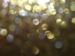 Obraz premium gold and silver glittering blurred sparkling lights abstract shiny abstract background