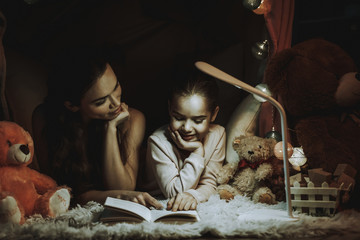 Mother and Daughter Reading a Book