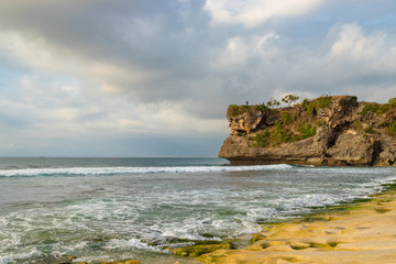 Cliff at Balangan beach, Bali island. Popular place for weddings. Indonesia