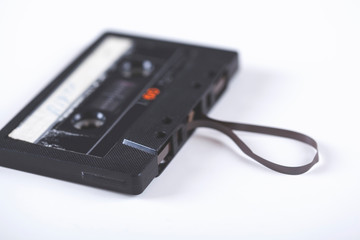 cassette retro tape on the white table background