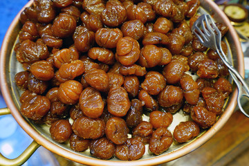 Marrons glaces candied chestnuts in an Italian candy store