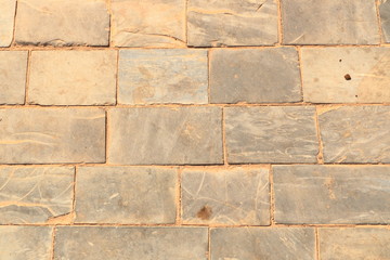 Ancient stone wall walkway background