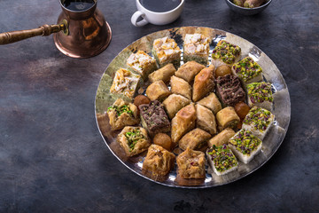 Traditional eastern sweets - baklava and delights with coffee. - 236176271