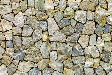Wall of gray  stone, decorative material, industrial and construction background, fence, masonry