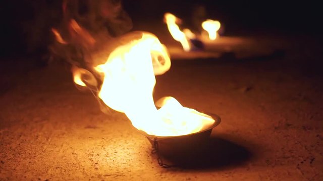 Three burning metal fire bowl with chains