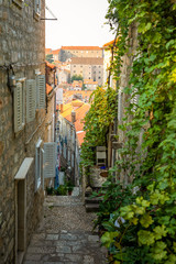 Fototapeta na wymiar Medieval narrow street in old town of Dubrovnik, Croatia