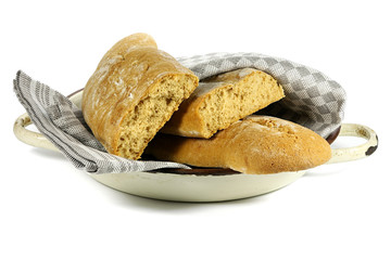 Frisian Keallepoat (calf's paw), a syrup cake that used to only be baked in the winter, in an enamel pan isolated on white background