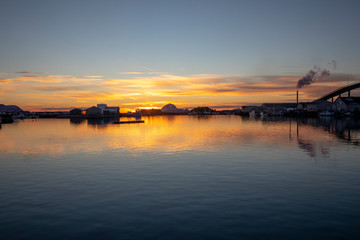 Cold winter sunset at Br&oslash;nn&oslash;ysund harbor in  Nordland county