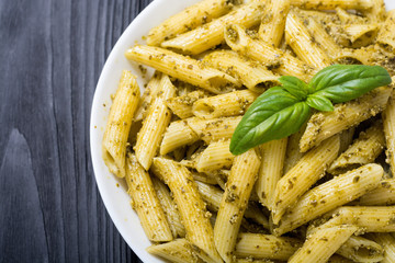 Italian penne pasta with sauce pesto