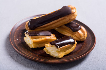 French dessert eclair with chocolate .
