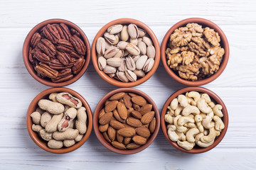 Mix of nuts : Pistachios, almonds , walnuts , pine nut , hazelnuts and cashew . Snack in bowl...