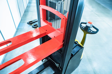 Forklift truck Stock. Warehouse management. Loading work. Automation of work in the warehouse.