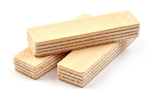 Crunchy vanilla waffles, isolated on a white background. Close-up.