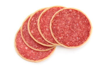Sliced Parmesano Salami. Salami rolled in cheese, isolated on a white background. Close-up