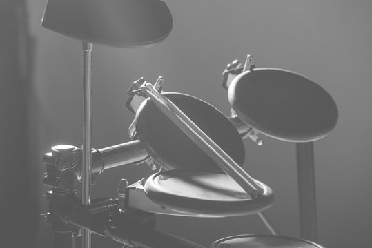 Drum sticks are on the electronic drum. Theme music.         