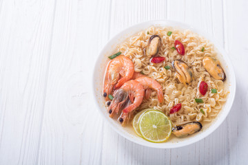Instant noodles soup with shrimps and mssels . Asian food
